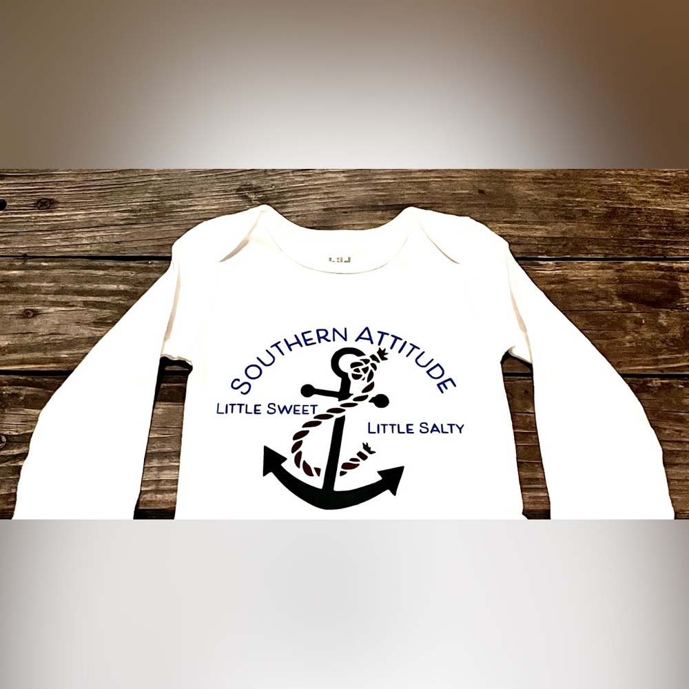 New White long sleeve onsie. Vinyl cut and heat pressed by me. Size 9 months